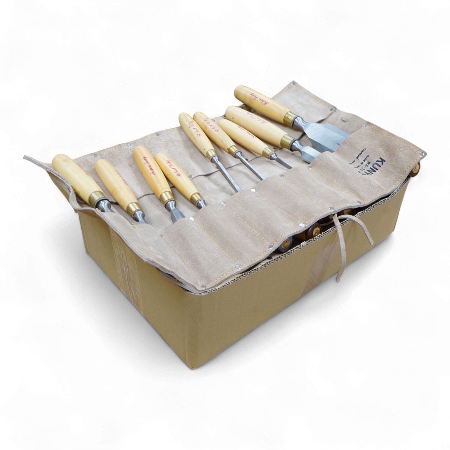 Five woodworking chisel sets, all in leather rolls, including an unused nine piece set by Robert Sorby, a six piece set by Henry Taylor, and three other sets showing some wear